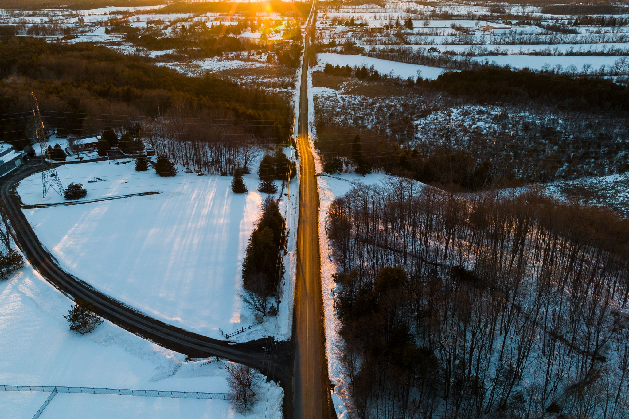 Aerial view of a rural road in winter