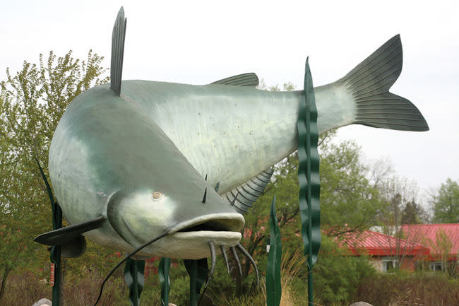 A large statue of a catfish