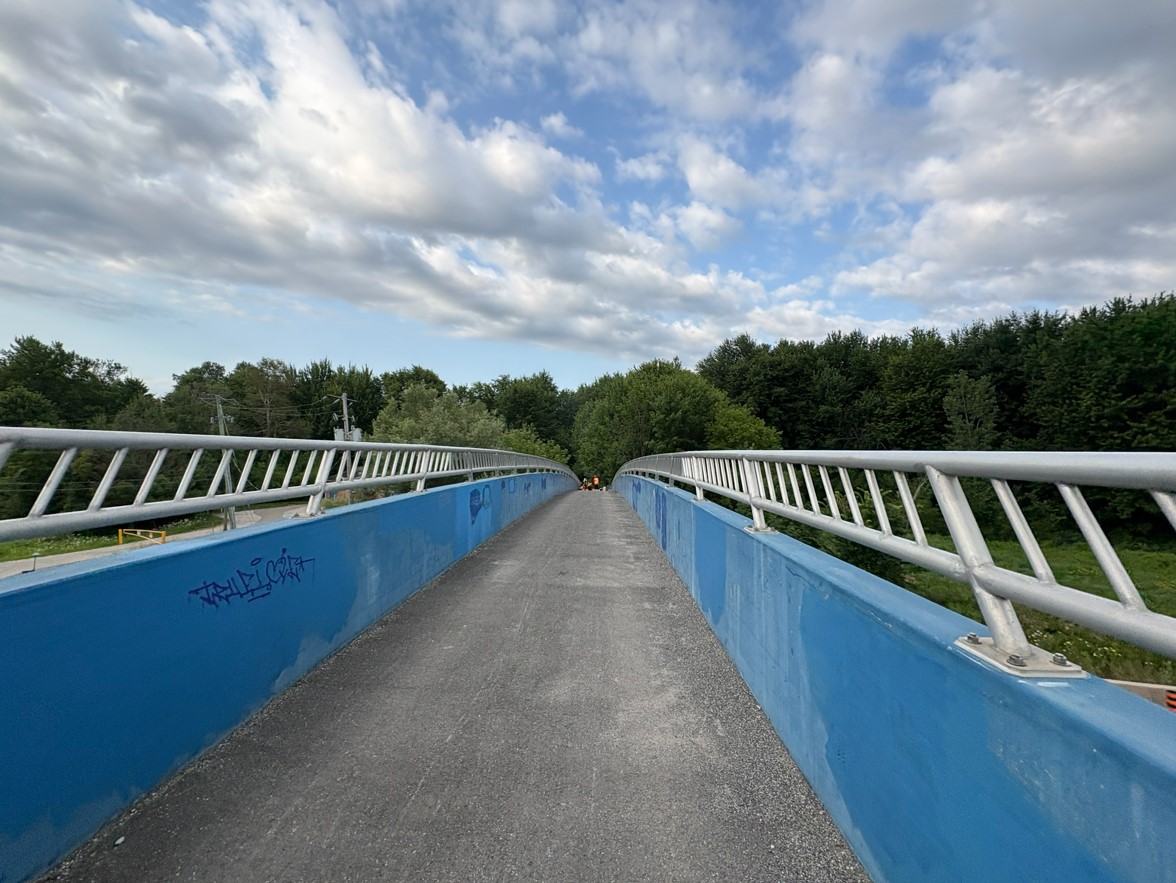 A pedestrian bridge over a highway