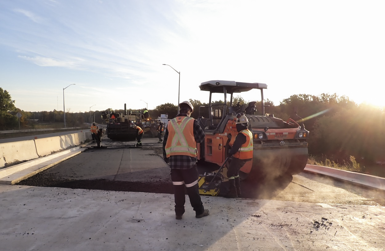 A construction crew working on a bridge