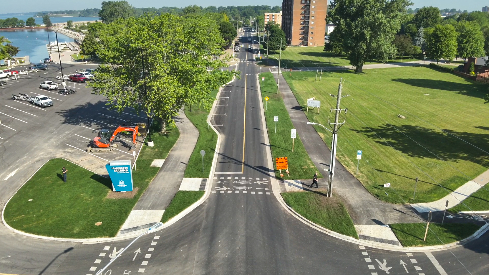 Aerial view of a road with new sidewalks and crosswalks