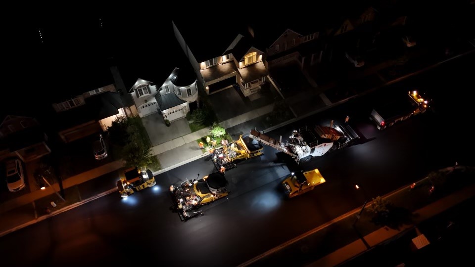 Overhead view of roadwork at night