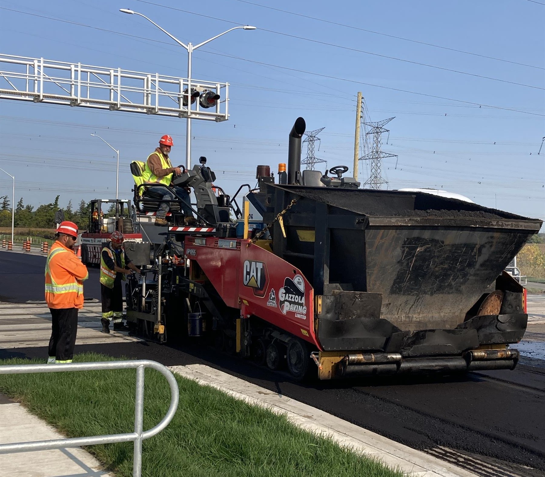 a construction crew paving a road