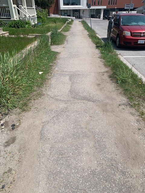 A badly worn sidewalk in the City of Orillia.