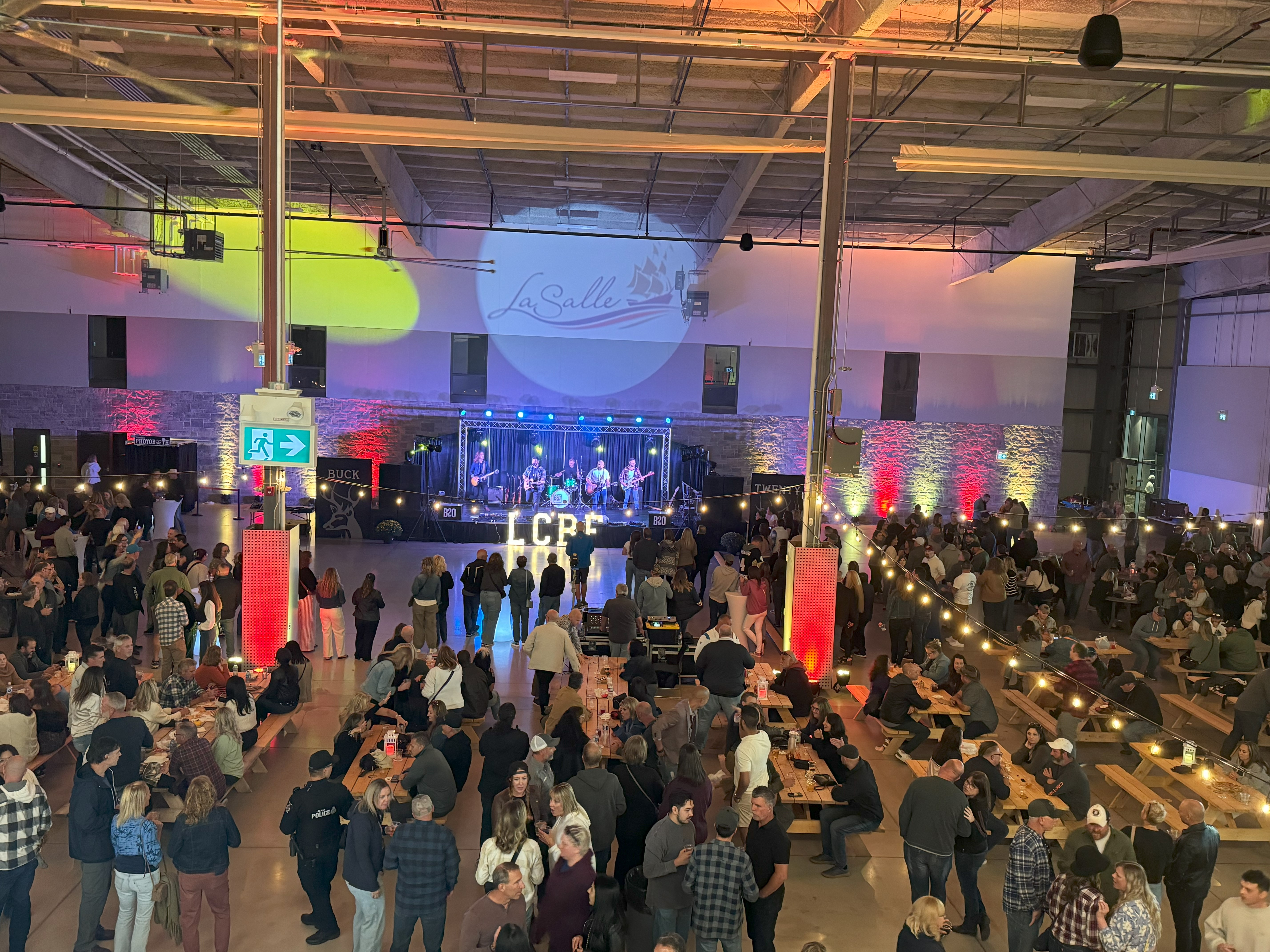 A large event hall filled with people