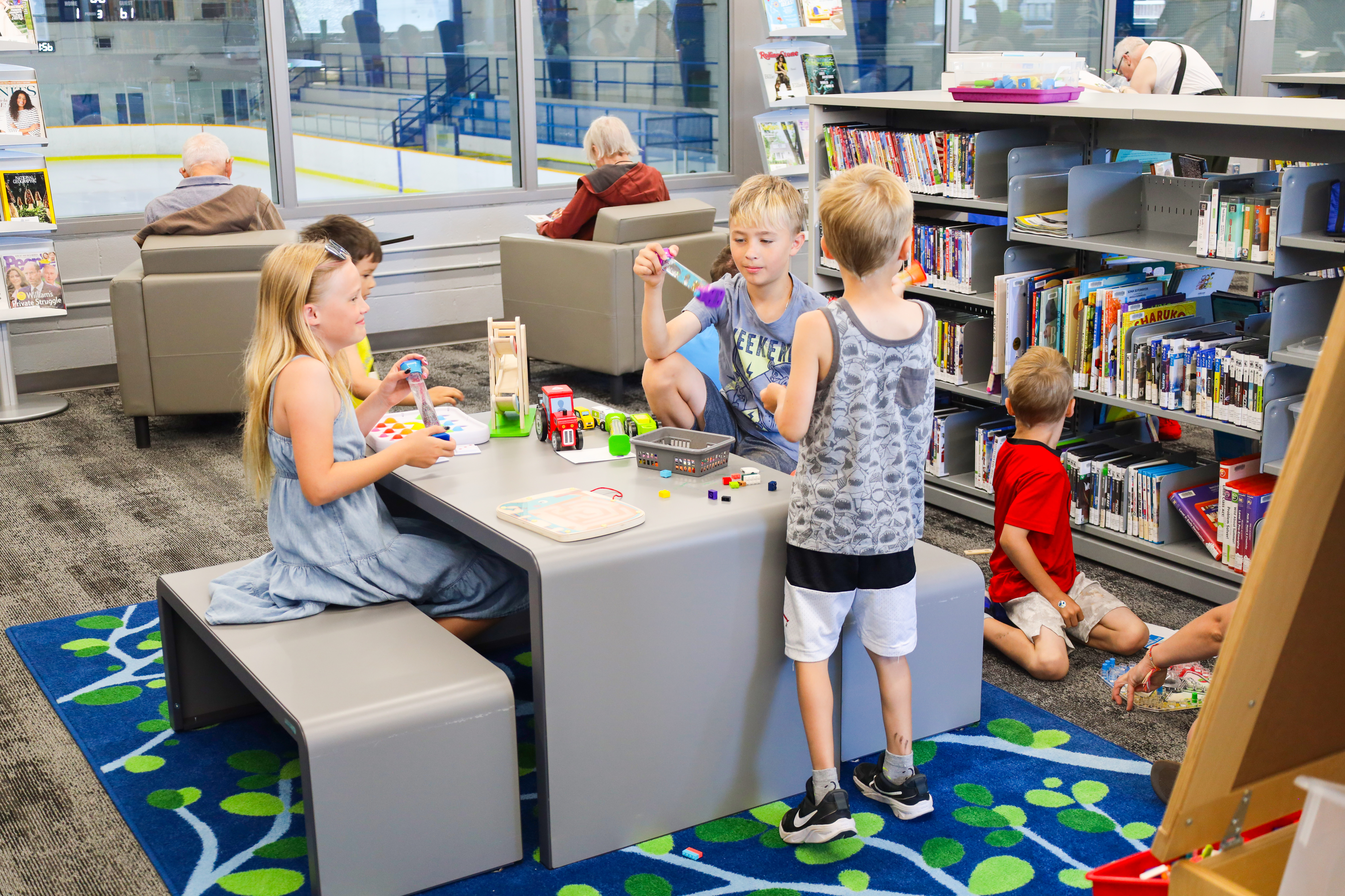 Kids playing in a library