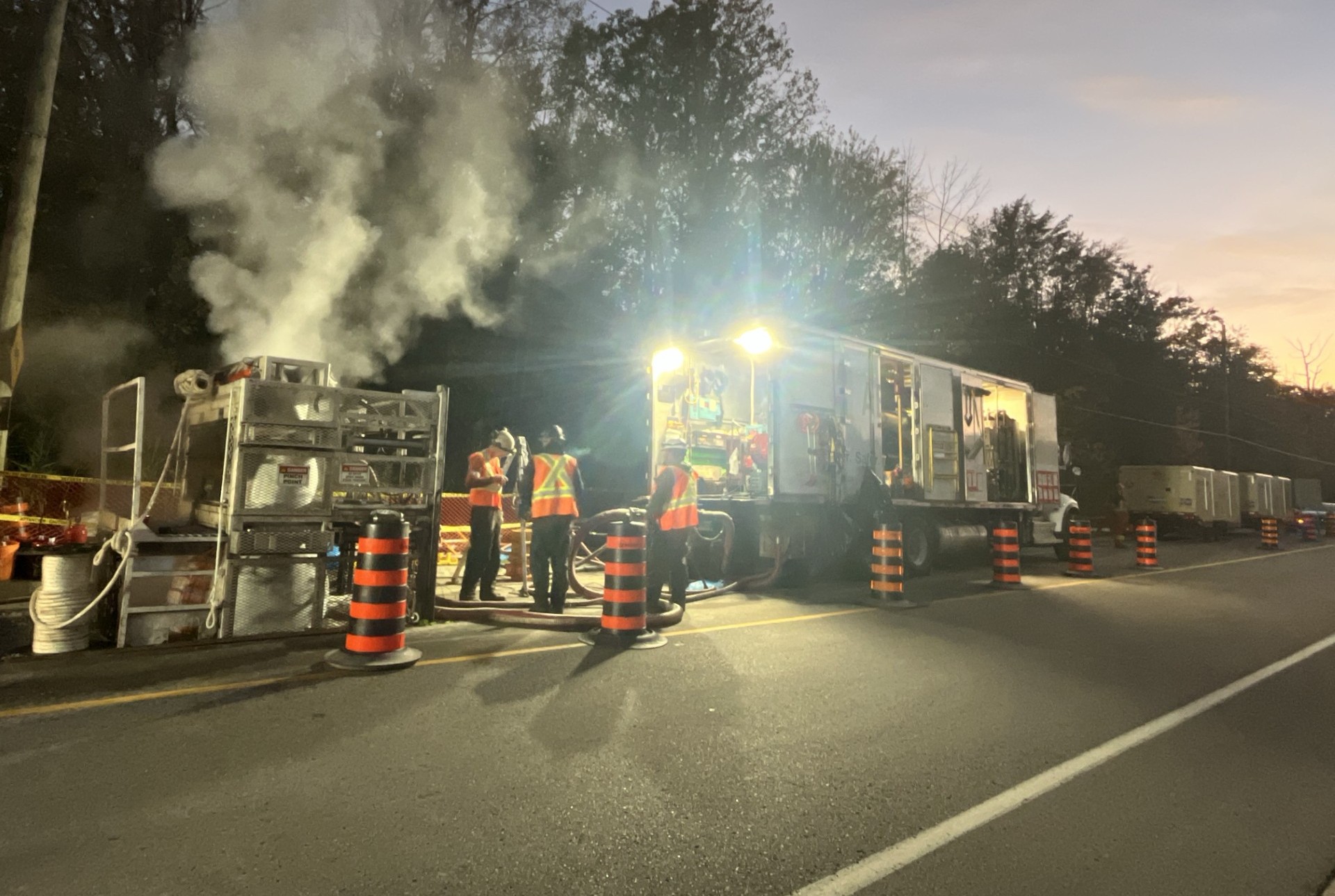 Construction crew installing new sewer