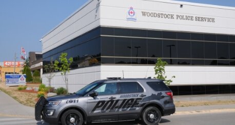 A police car outside a police station