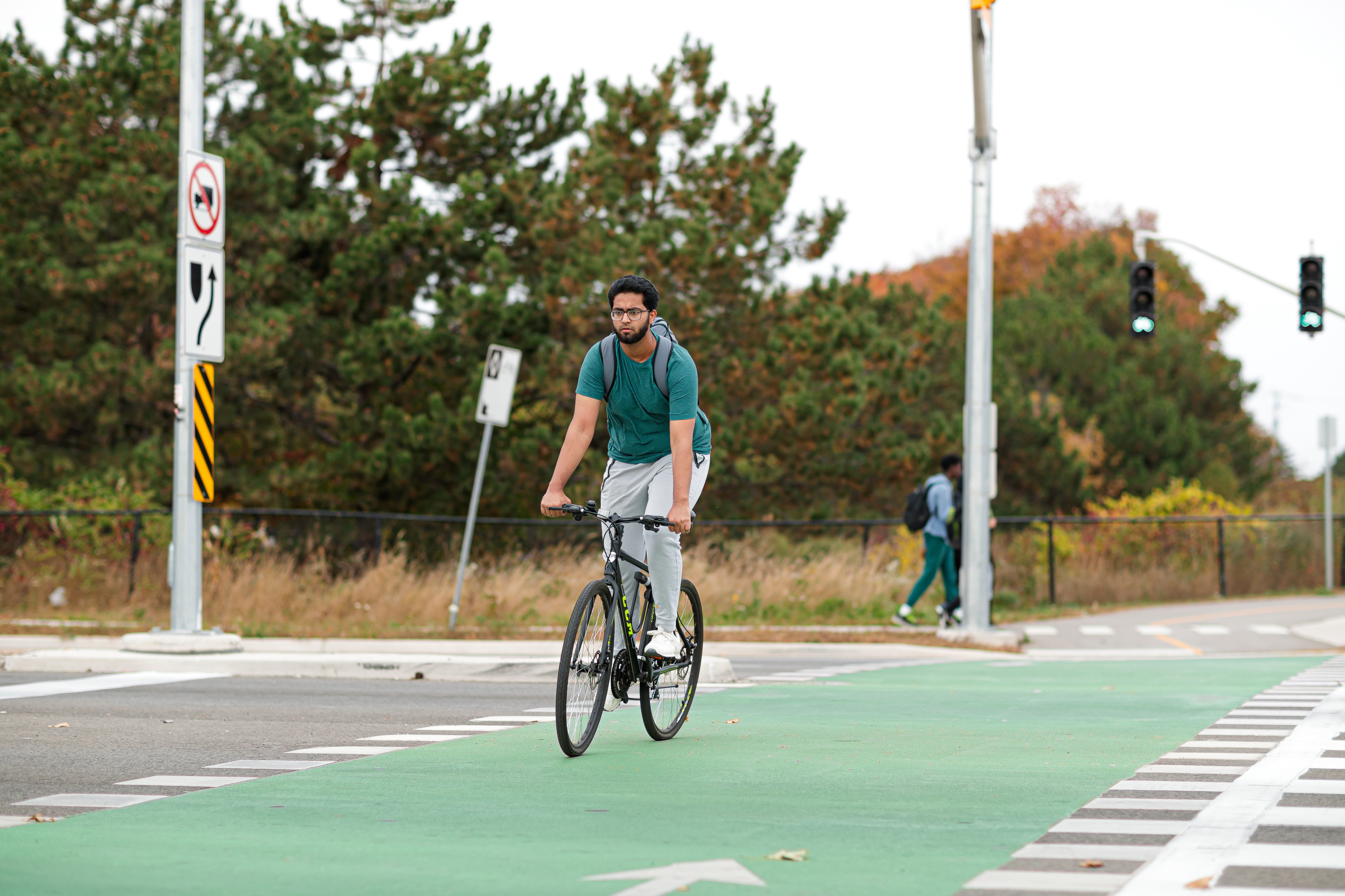 A man biking on a road