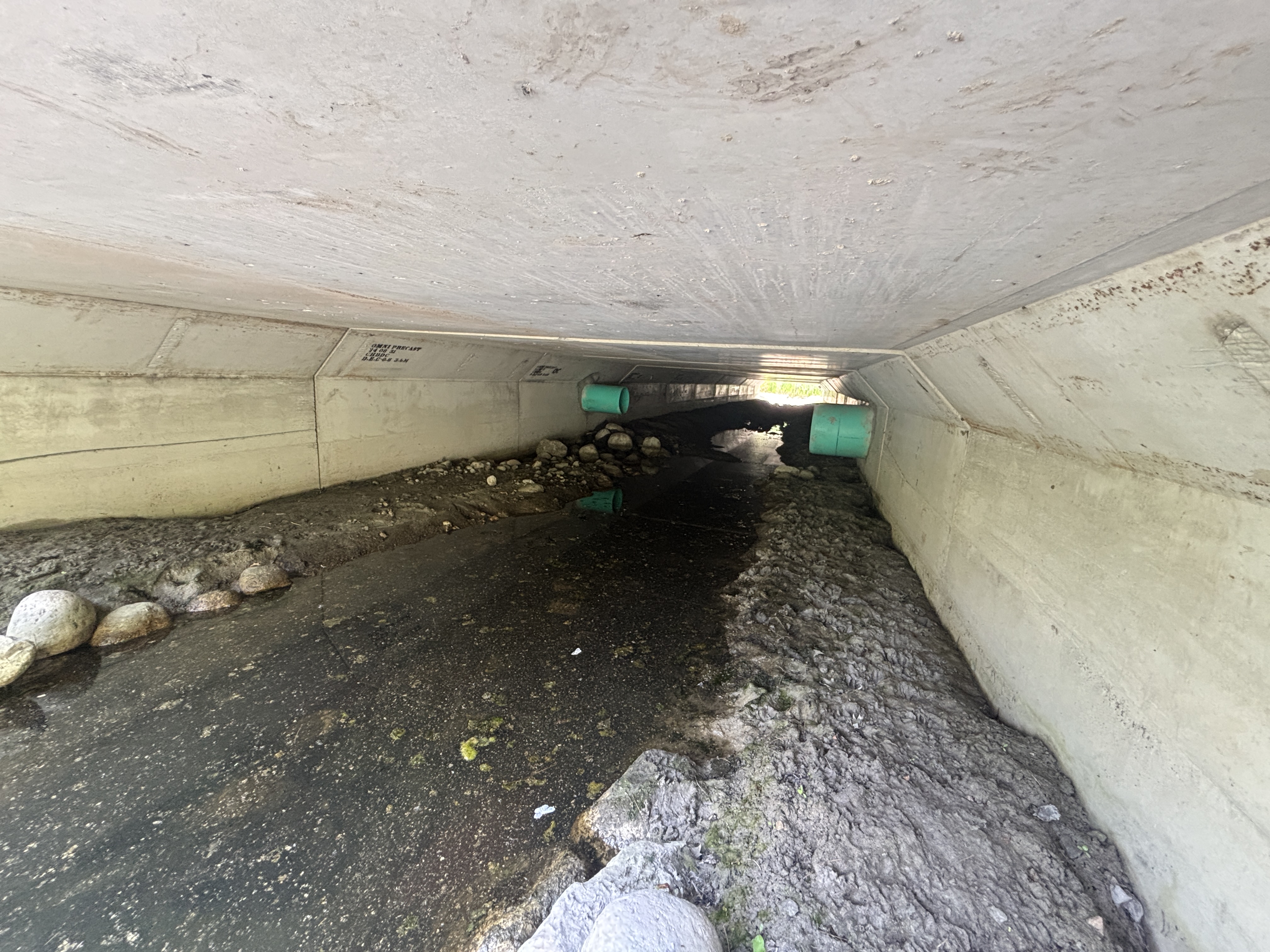 underneath a culvert