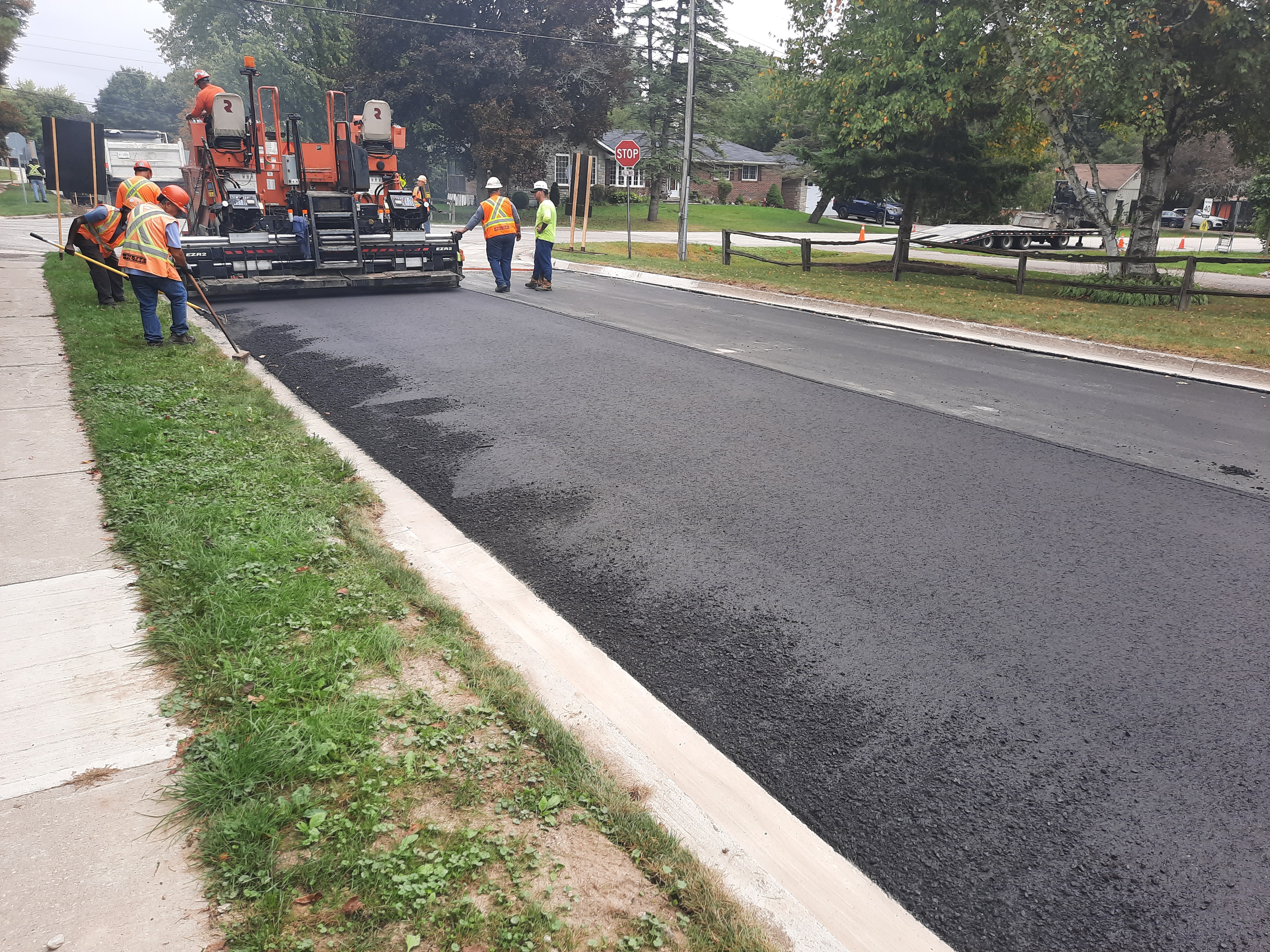 A residential road being paved