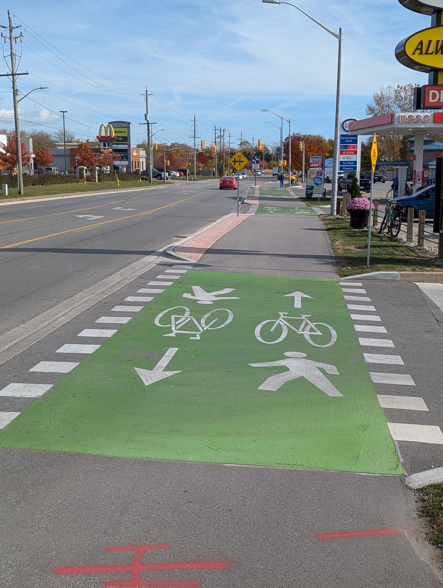 Bike and pedestrian crossings near a gas station
