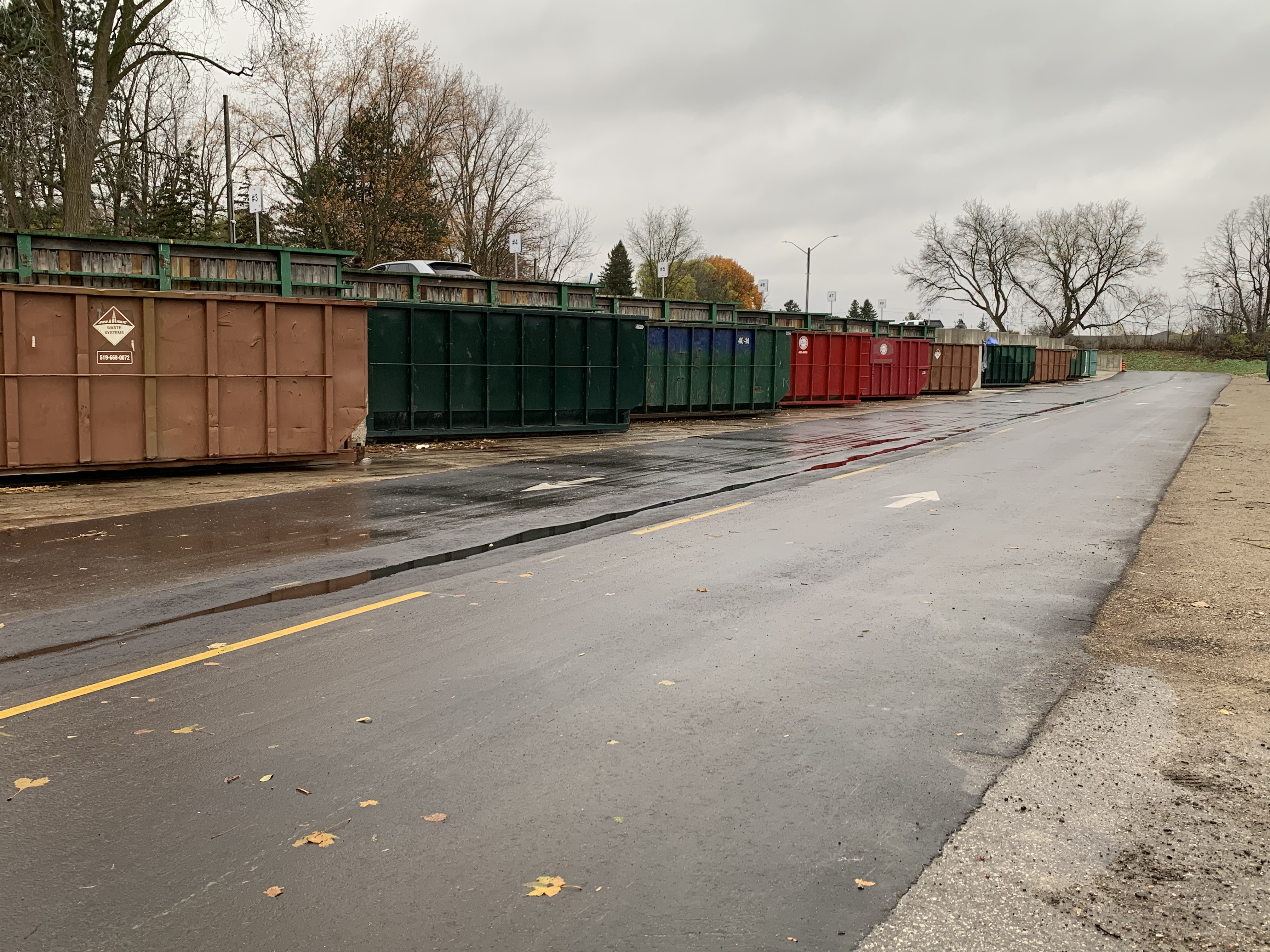 A line of dumpsters