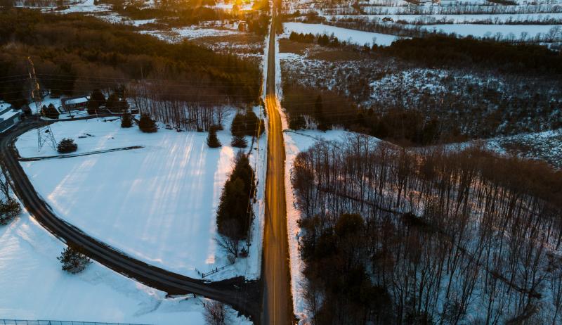 Aerial view of rural road in winter