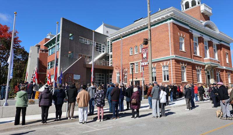 People gathered for a ceremony at a public square