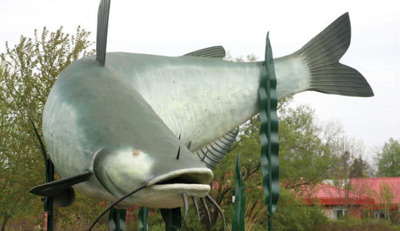 A large statue of a catfish