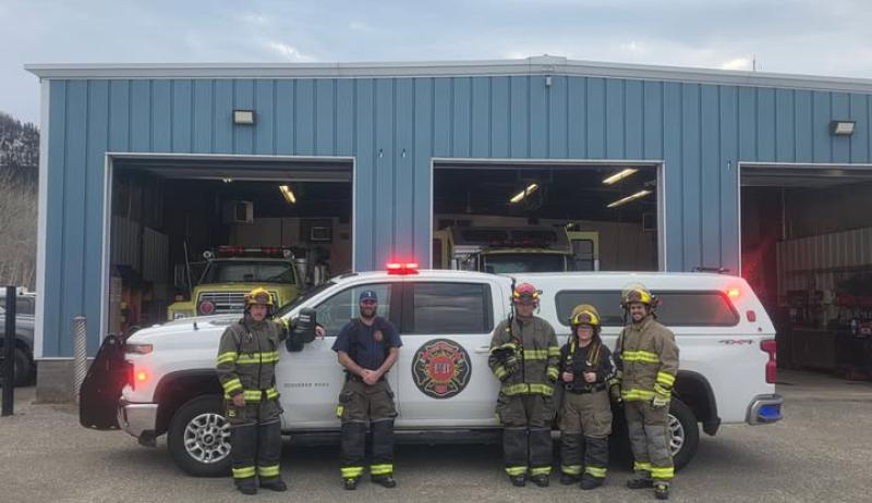 firefighters with a rescue truck