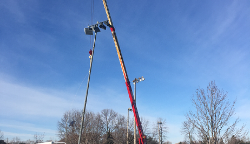Photo of crane installing LED lights at Pickering's Kinsmen Park