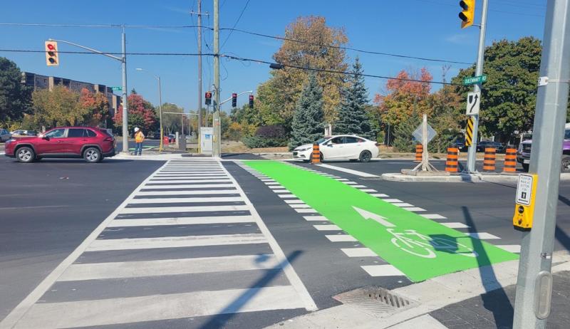A crosswalk with a bike lane