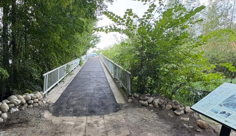 A pedestrian bridge over a highway
