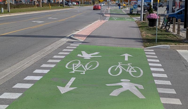 Bike and pedestrian crossings near a gas station