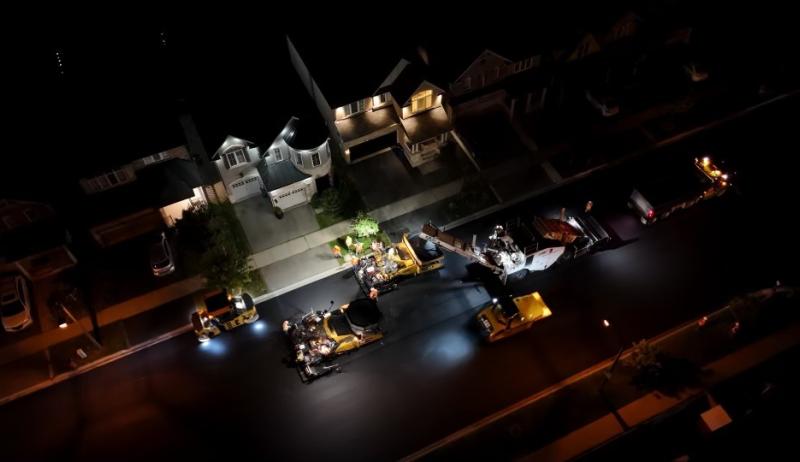 Overhead view of roadwork at night