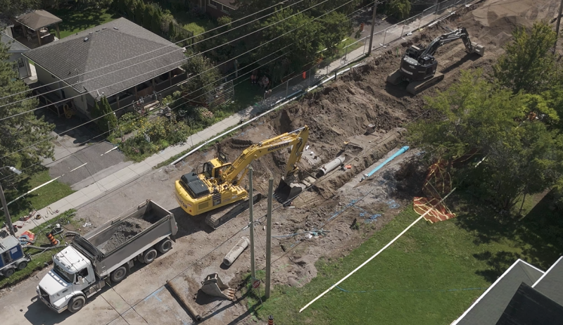 construction of underground pipes on residential street