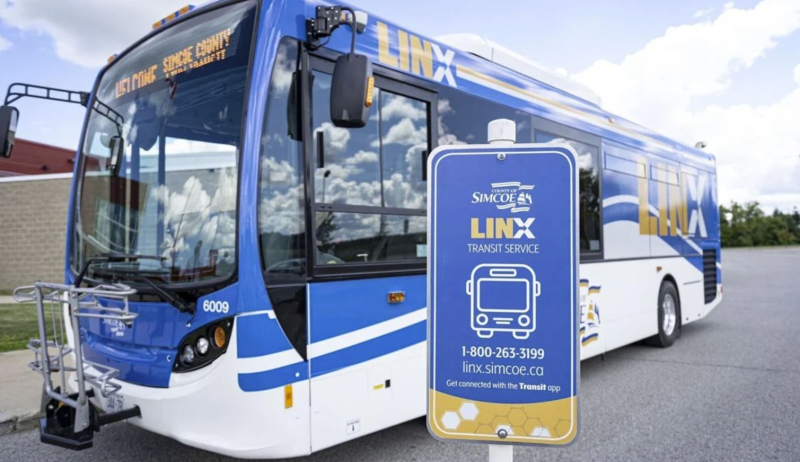 A blue public transit bus. 