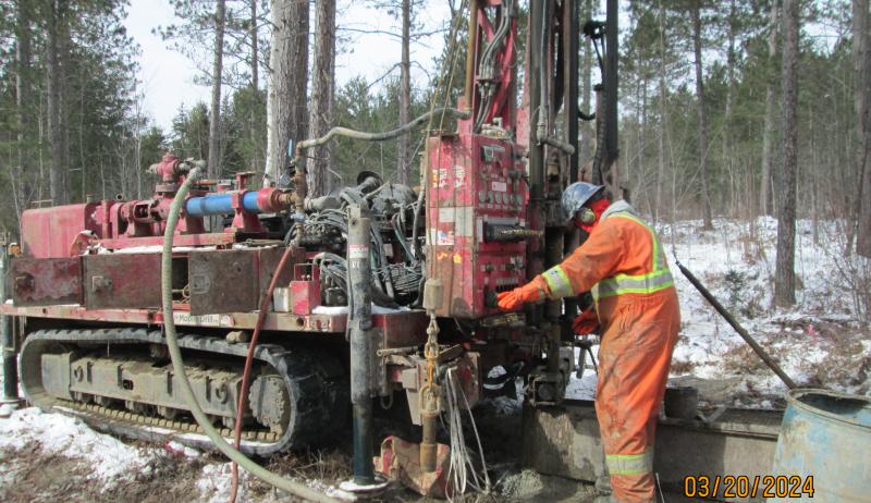 Construction worker drilling