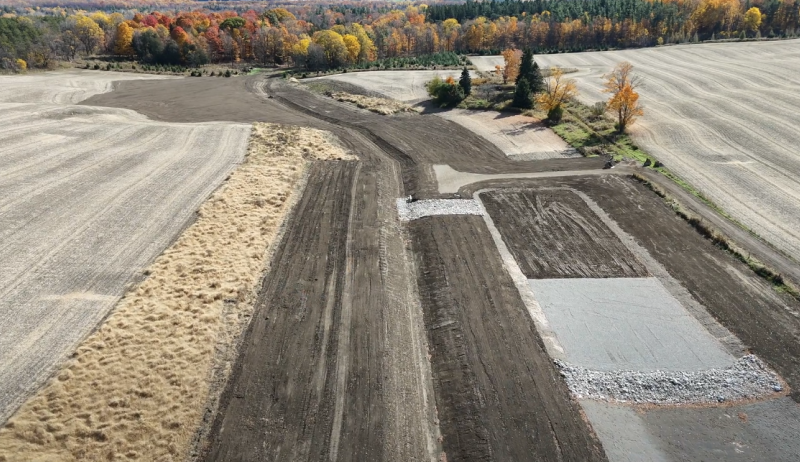 An overhead view of a field prepared to be a stormwater pond