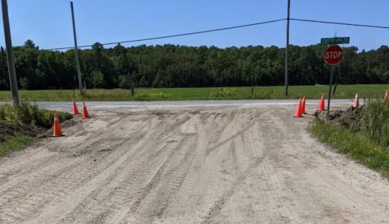 A photo of a gravel roadway in the Township of Plummer Additional. 