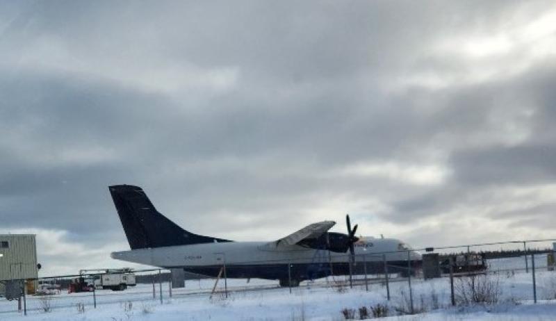 An airplane sits at the Pickle Lake airport. 