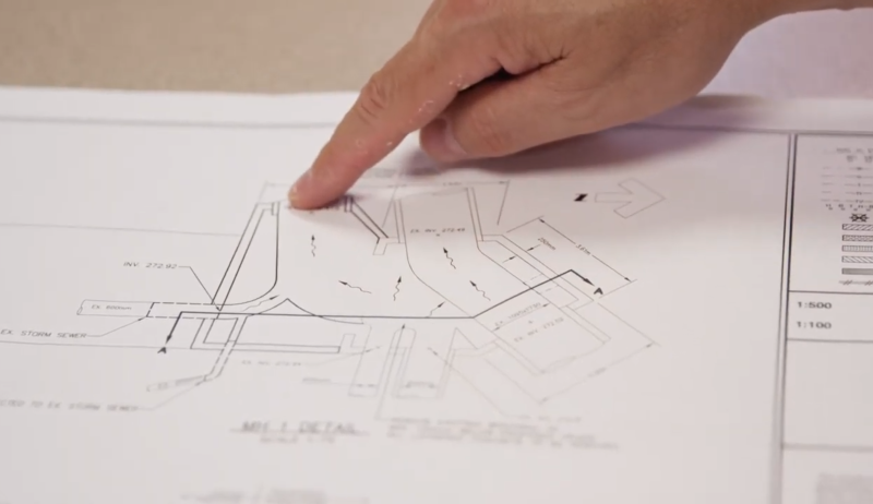 A photo of the plans for the twinning of a stormwater outfall