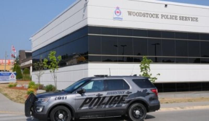 A police car outside a police station