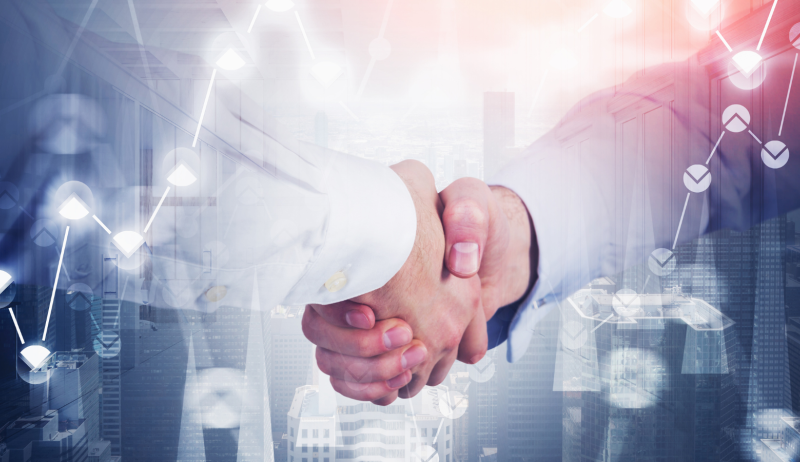 A stock image of two people shaking hands. 