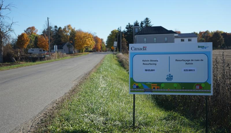 A road with a CCBF sign beside it