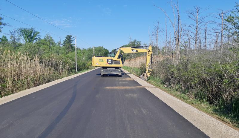 A photograph showing roadwork being carried out in Puslinch, Ontario.